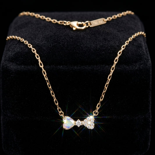 Collar Moño pequeño bañado en oro de 14 Kilates