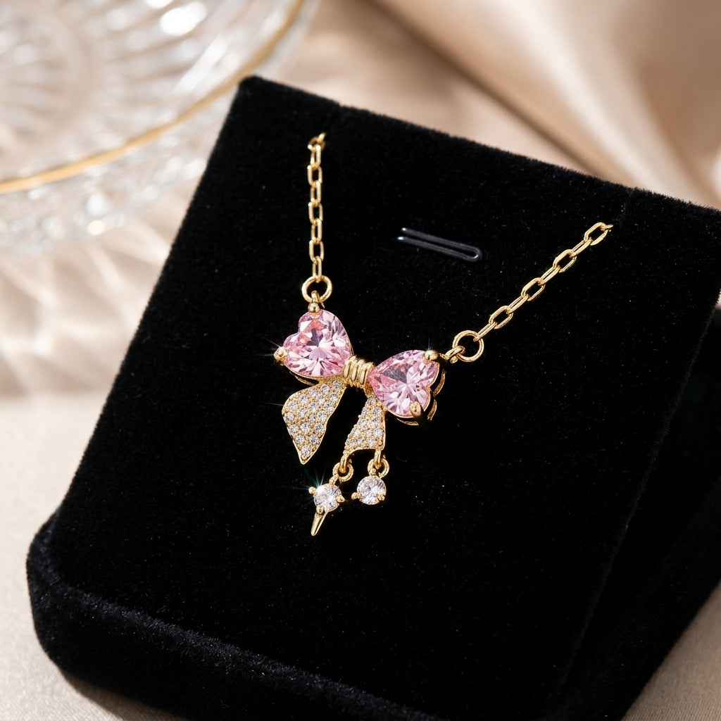 Collar Moño Rosa bañada en oro de 14 Kilates