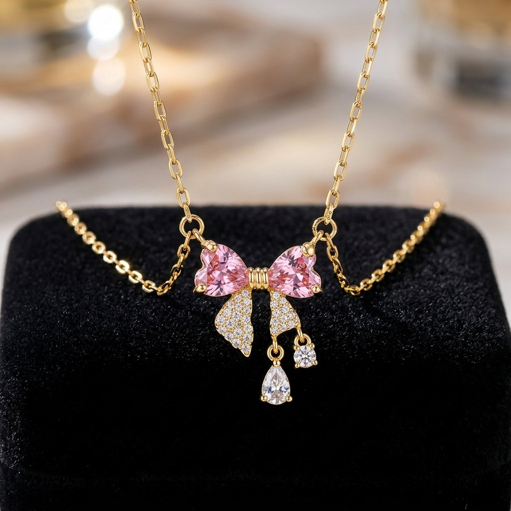 Collar Moño Rosa bañada en oro de 14 Kilates