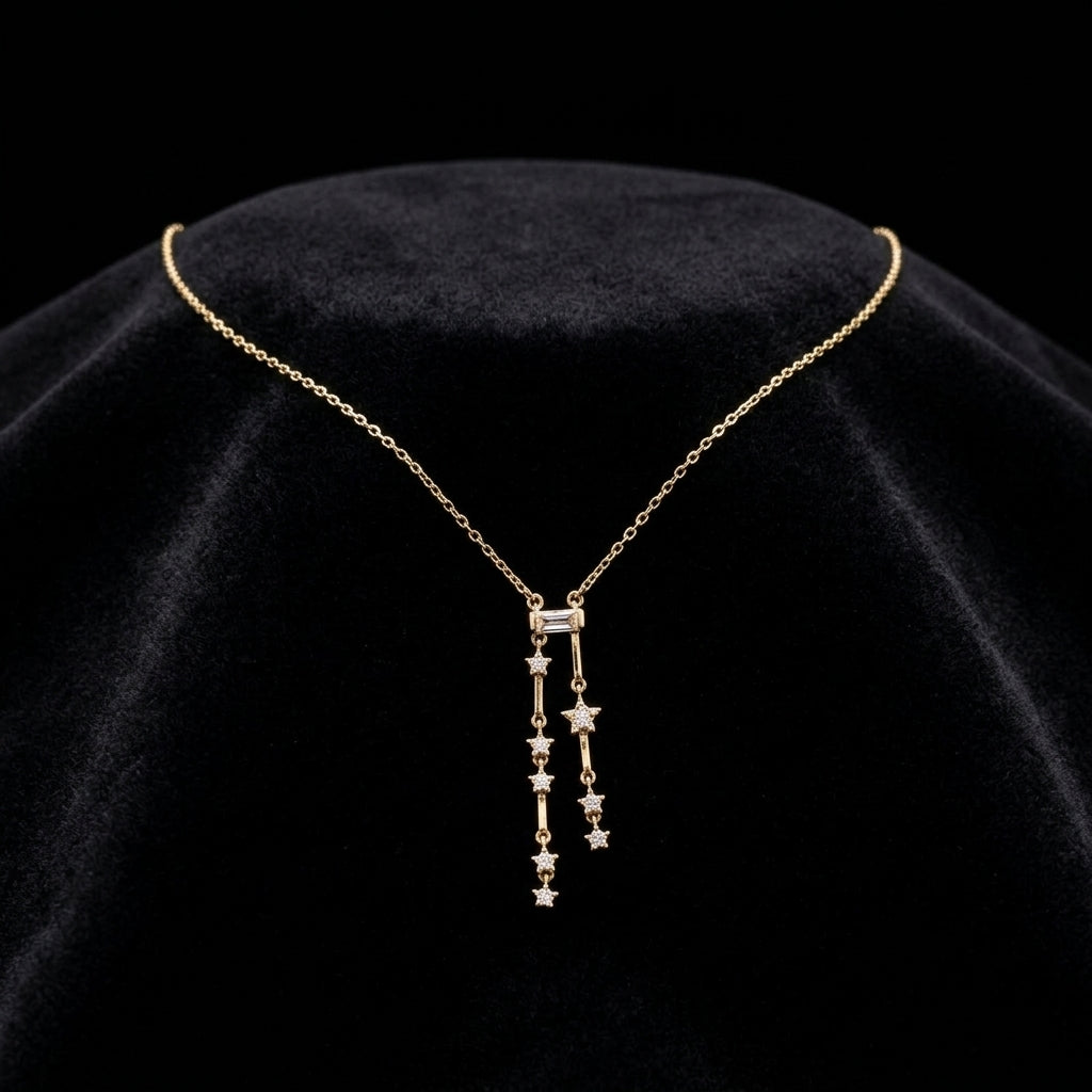 Collar de estrellas pequeñas bañada en oro de 14 Kilates