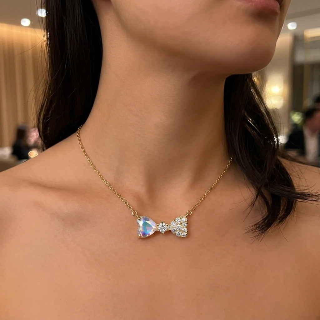Collar Moño pequeño bañado en oro de 14 Kilates